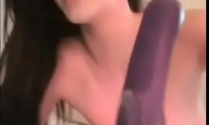 Teen babe licks her own cum off her dildo